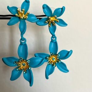 Blue statement earrings.
